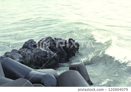 Image of waves crashing on Imrang Beach in Busan, Korea Image of waves crashing on Imrang Beach in Busan, Korea 120804079