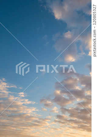 Sunrise sky with floating sheep clouds 120805327