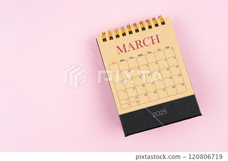 March 2025 desk calendar on pink color background, Position with copy space. 120806719
