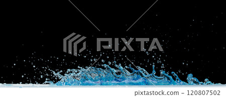 Crown Water splash on object to create shape form fluttering in droplet and wave. Crown water to object make curve drop explosion in ripple motion. Black background isolated Crown Water splash on object to create shape form fluttering in droplet and wave. Crown water to object make curve drop explosion in ripple motion. Black background isolated 120807502