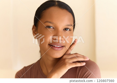 Young Woman With Radiant Skin Practicing Natural Beauty and Face Care Young Woman With Radiant Skin Practicing Natural Beauty and Face Care 120807560