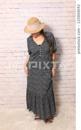 Woman Wearing Baggy Summer Full Length Dress Woman Wearing Baggy Summer Full Length Dress 120808042