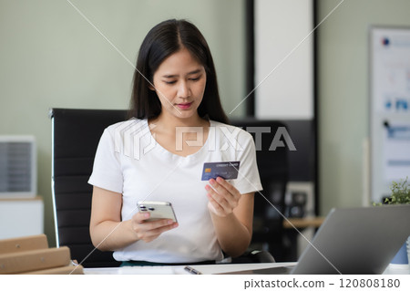 online shopping concept, woman shopping online is a form of electronic commerce from a seller over internet. 120808180