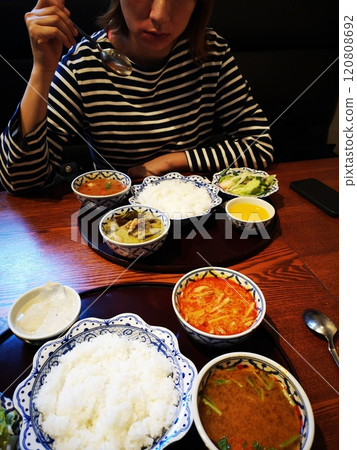 Eating Thai curry during the Kanda Curry Street Food Stamp Rally 120808692
