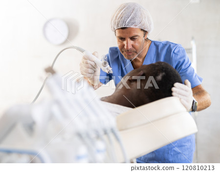 cosmetologist enhanced client's complexion 120810213