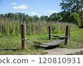Relaxation Spot in Nature with Wooden Hammock 120810931