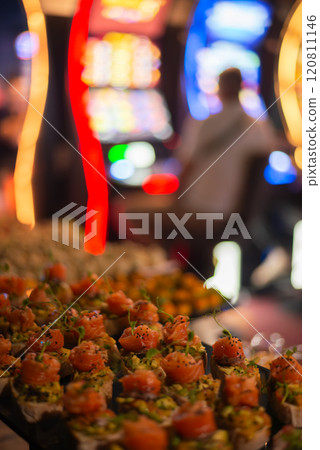 catering buffet table with snacks and appetizers. Set of canapes with jamon, bruschetta, pear and cheese catering buffet table with snacks and appetizers. Set of canapes with jamon, bruschetta, pear and cheese 120811146