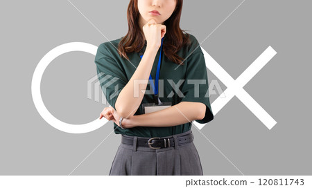 A woman/businesswoman thinking about whether to pass or fail A woman/businesswoman thinking about whether to pass or fail 120811743
