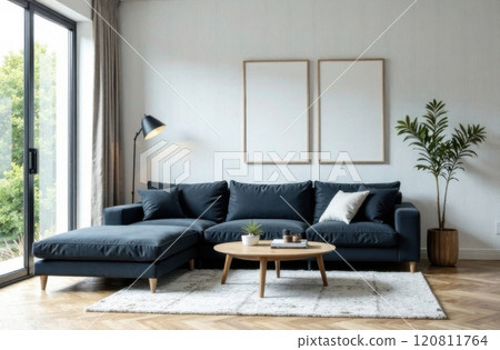 Modern living room with an emphasis on minimalist design. The space features a low-profile sofa, a sleek coffee table, and details of simple decor and artwork Modern living room with an emphasis on minimalist design. The space features a low-profile sofa, a sleek coffee table, and details of simple decor and artwork 120811764