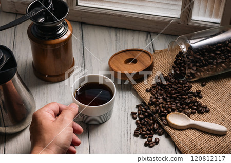 Coffee beans and a cup of coffee 120812117