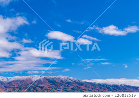 Snow-capped Mt. Hachibuse in autumn Snow-capped Mt. Hachibuse in autumn 120812519