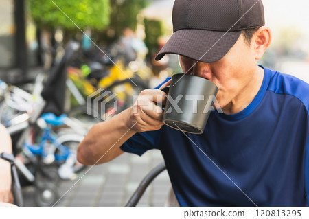 Man relaxing drinking coffee in the morning. 120813295