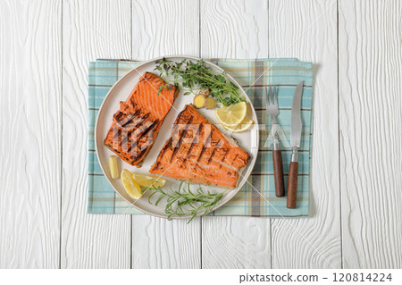 grilled salmon fish fillet with herbs, top view grilled salmon fish fillet with herbs, top view 120814224