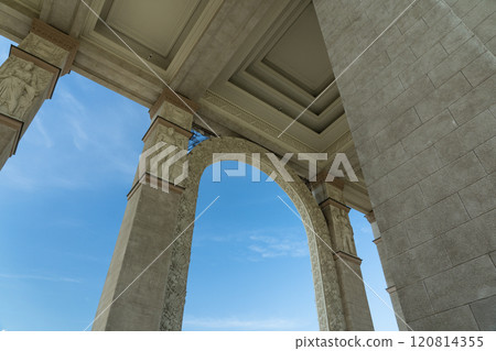 Tall, massive columns of a vintage, old building. Bottom-up view 120814355