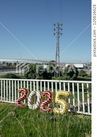 2025 number-shaped baloons outdoors 120816028