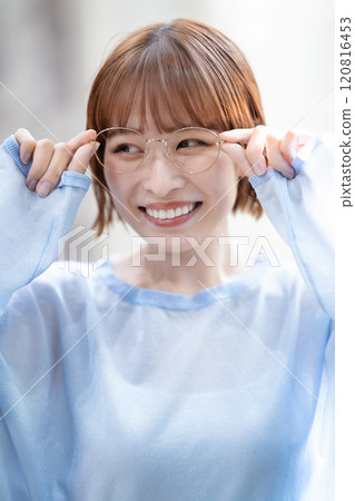 A young woman with a feminine short bob A young woman with a feminine short bob 120816453
