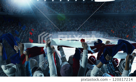 Back view of enthusiastic fans raising national flags and scarves while cheering for their team in vibrant sports stadium. Hockey game Back view of enthusiastic fans raising national flags and scarves while cheering for their team in vibrant sports stadium. Hockey game 120817214
