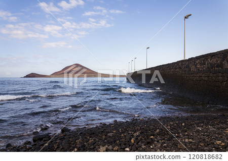 Montana Roja mountain on Tenerife coast near El Medano, Canary Islands, Spain, sunny summer day Montana Roja mountain on Tenerife coast near El Medano, Canary Islands, Spain, sunny summer day 120818682