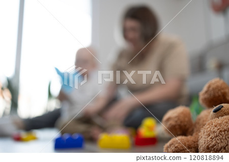 Enjoying Happy Playtime Moments with Child and Their Colorful Toys at Home Together 120818894