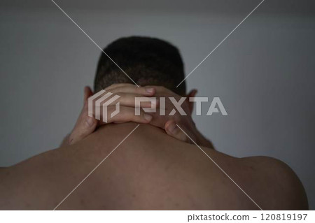 30-year-old man is stressed, holding his head with his hands 30-year-old man is stressed, holding his head with his hands 120819197