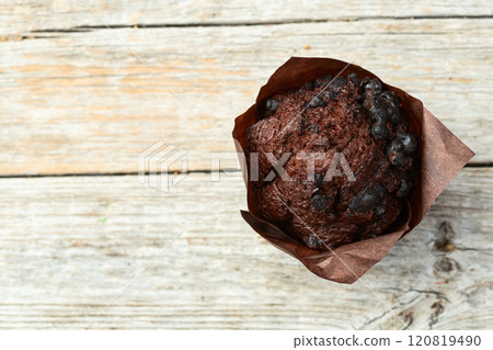 Sweet Baked chocolate muffins ( cupcake )  . Top view Sweet Baked chocolate muffins ( cupcake )  . Top view 120819490