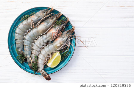 Raw big tiger ( king ) shrimps photography . Top view 120819556