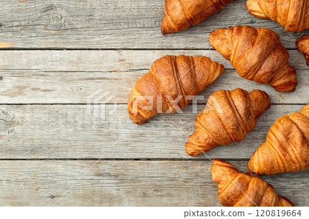 Group of sweet croissant . French morning breakfast . Top view Group of sweet croissant . French morning breakfast . Top view 120819664
