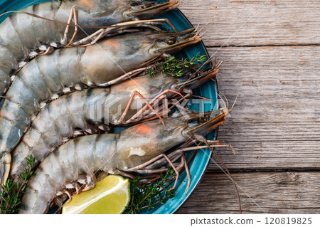 Raw big tiger ( king ) shrimps photography . Top view 120819825