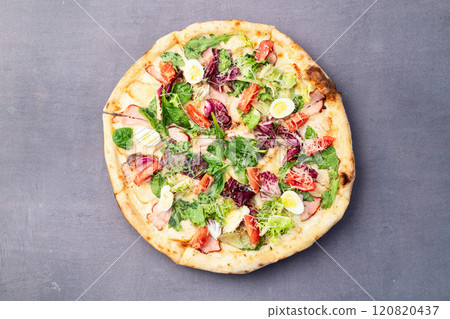 Italian pizza caesar with eggs salad chicken tomatoes and mozzarella photography. top view 120820437
