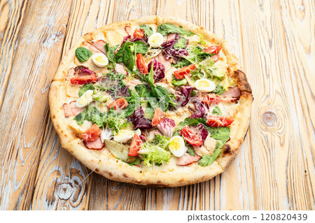 Italian pizza caesar with eggs salad chicken tomatoes and mozzarella photography. top view Italian pizza caesar with eggs salad chicken tomatoes and mozzarella photography. top view 120820439