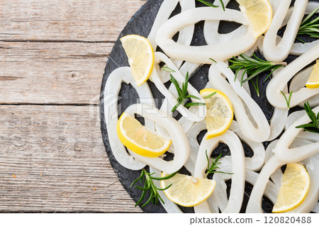 Squid tube and ring photography . Seafood top view 120820488