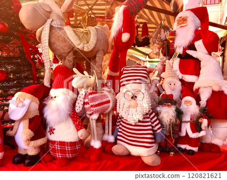 Colourful snowmen and Santa Clauses at a street market 120821621