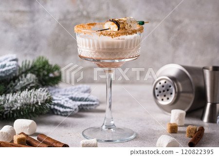 Christmas cocktail with toasted marshmellow Christmas cocktail with toasted marshmellow 120822395