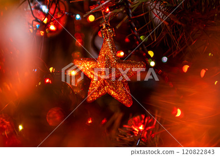 Beautiful festive decorations on the Christmas tree. New Year 2025 120822843