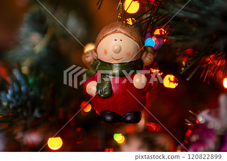 Beautiful festive decorations on the Christmas tree. New Year 2025 120822899