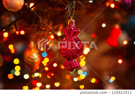 Beautiful festive decorations on the Christmas tree. New Year 2025 120822911