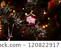Beautiful festive decorations on the Christmas tree. New Year 2025 120822917