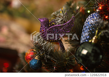 Beautiful festive decorations on the Christmas tree. New Year 2025 120822918
