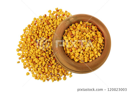 Bee pollen grains in wooden bowl isolated on white background. Top view. Flat lay Bee pollen grains in wooden bowl isolated on white background. Top view. Flat lay 120823003