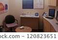 Diabetes care room featuring a consultation desk, glucose meter, and educational posters about diabetes management. The space includes a table for blood sugar testing demonstrations 120823651