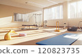 A modern physiotherapy rehabilitation room with therapy mats, balance boards, resistance bands, parallel bars for gait training, an exercise bike, and a wall mirror for movement correction. 120823735