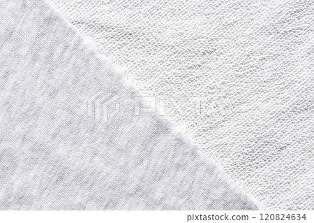 Close up of soft white textured fabric with diagonal seam and fluffy surface Close up of soft white textured fabric with diagonal seam and fluffy surface 120824634