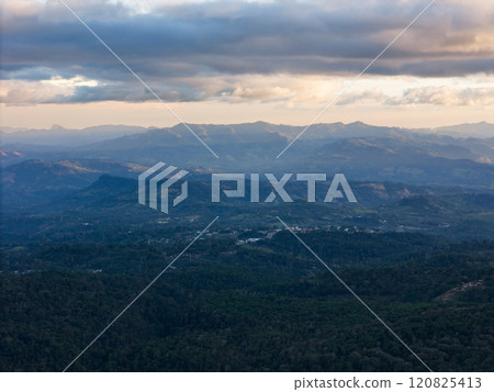 Stunning view of mountain landscape under dramatic sky at sunset in remote area 120825413
