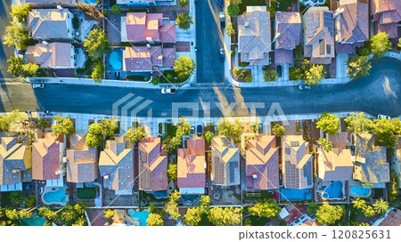 Aerial of Suburban Grid with Red Roofs and Solar Panels 120825631