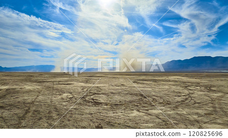 Aerial of Dust Devils Over Nevada Desert and Mountain Horizon Aerial of Dust Devils Over Nevada Desert and Mountain Horizon 120825696