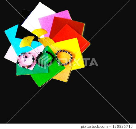 [Bracelet] and yellow ginkgo leaves and colored paper 120825713