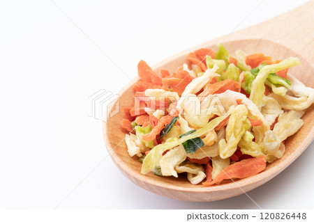 Mix of dried vegetables for topping on a wooden spoon Mix of dried vegetables for topping on a wooden spoon 120826448
