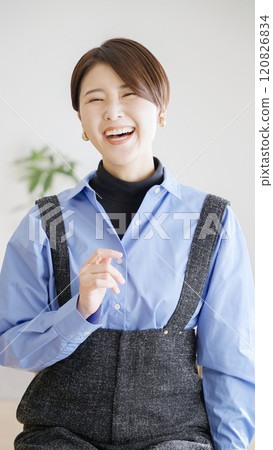 A woman with a smile A woman with a smile 120826834