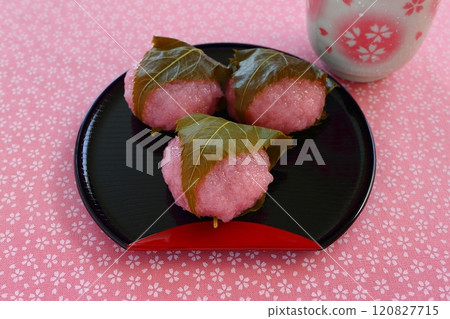 Kansai-style Sakuramochi with a cherry blossom pattern background 120827715