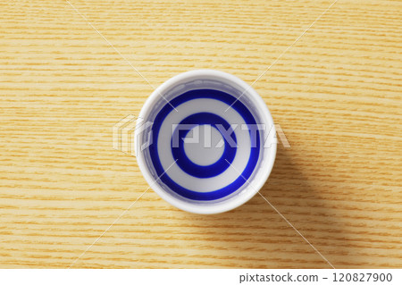 Sake poured into a white sake cup Sake poured into a white sake cup 120827900